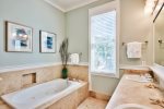 Master Bath Features Jacuzzi Tub, Walk in Shower, and Double Vanities